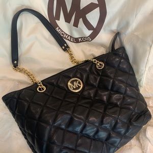 Michael Kors black quilted, gold hardware tote